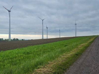 I saw hundreds of wind turbines in Germany. These ones are near Ausleben, Sachsen-Anhalt A few wind turbines near a rural lane in Germany
