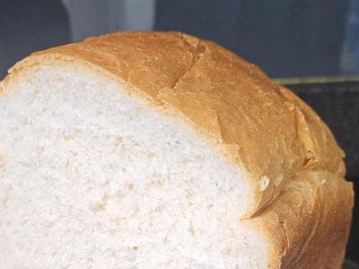 Plain White Loaf White sandwich loaf with one end sliced to show a soft, even crumb.